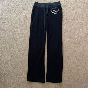 Black sweatpants with glitter heart
